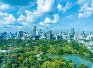 Beautiful landscape of cityscape with city building around lumpini park in bangkok Thailand